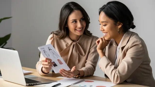 AI image of 2 girls discussing online shape analysis